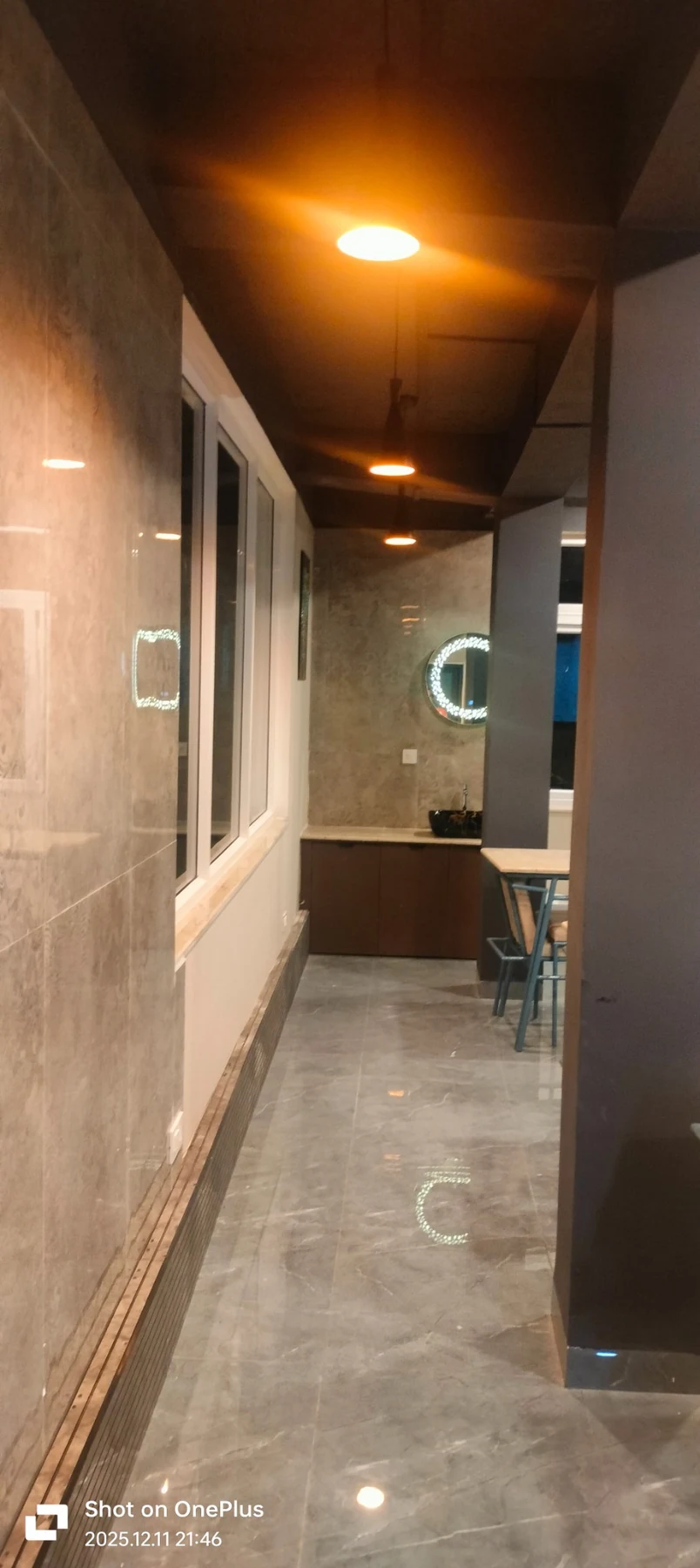 Corridor with basin and lighting