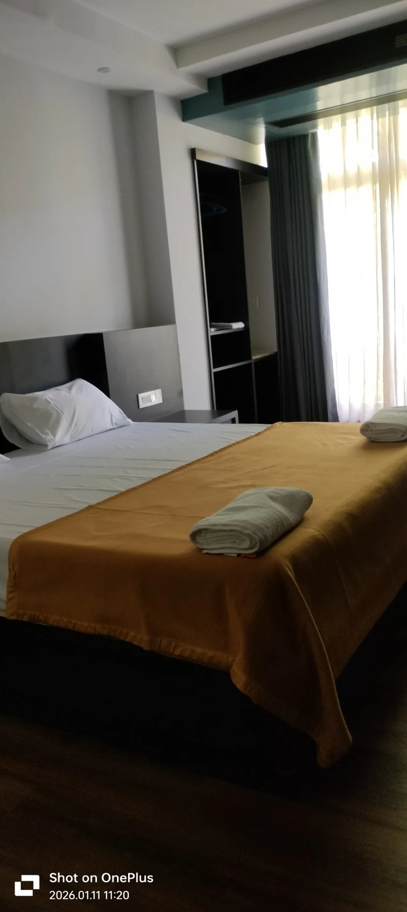 Prepared room with bed and towels